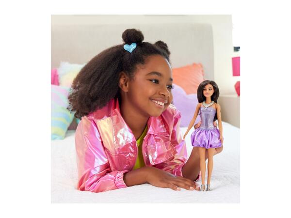 Barbie Doll In A Sparkly Purple Dress