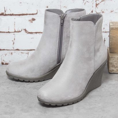 Bottines à talons compensés