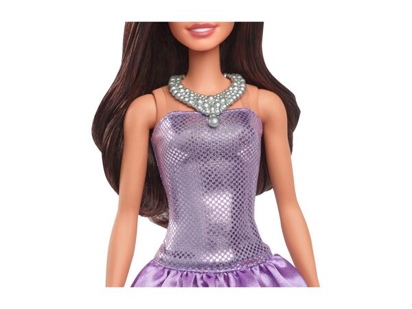 Barbie Doll In A Sparkly Purple Dress