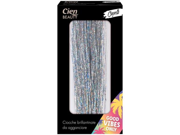 Clip-in hair tinsel, self-adhesive face jewels, stick-on tattoos or self-adhesive nail stickers