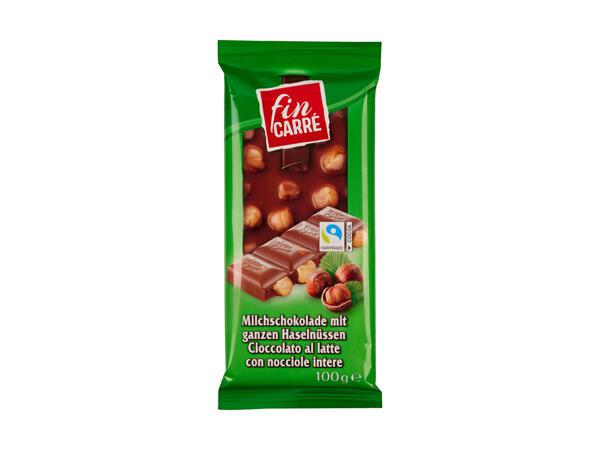 Milchschokolade mit ganzen Haselnüsse​