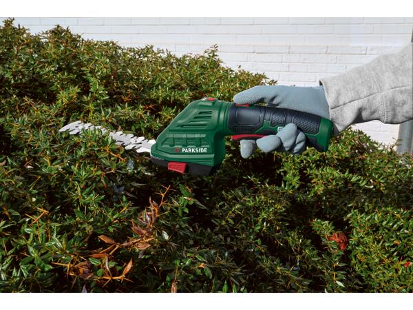 Batteridriven gräs- och busktrimmer