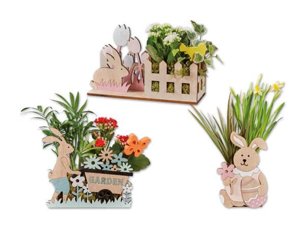 Bepflanzte Osterholzfiguren