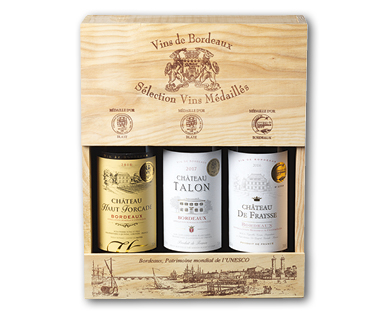 Coffret en bois comprenant trois vins rouges primés français