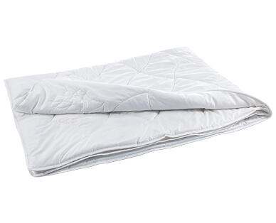 MY LIVING STYLE
DUVET SURPIQUÉ EN LAINE DE MOUTON ET AROLLE