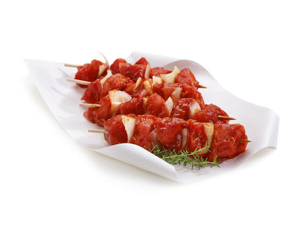 Brochettes de porc aux oignons