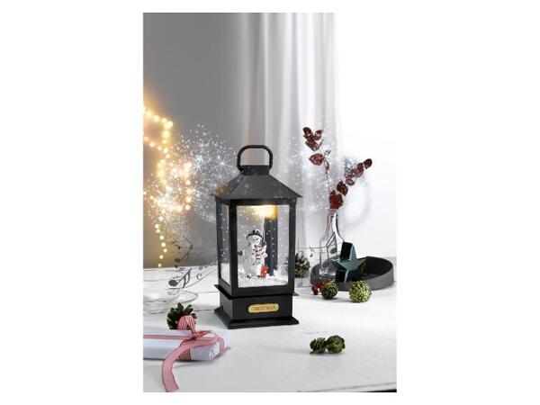 LED lucerna s efektem sněhové vánice