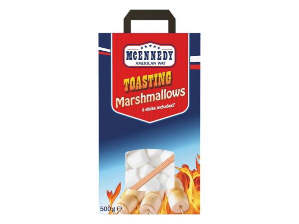 Toasting marshmallows with sticks