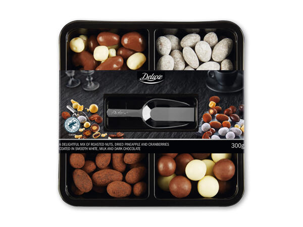 Nødder og frugt med chokoladeovertræk