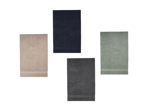Serviette de bain en tissu éponge