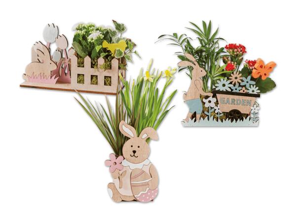 Bepflanzte Osterholzfiguren