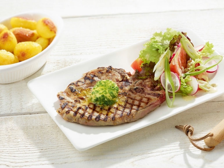 Côte de porc au spiringue grillée aux grenailles