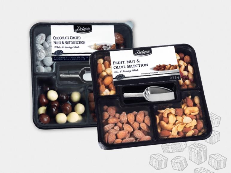 Chocolat de luxe, mélange de fruits et de noix avec pelle