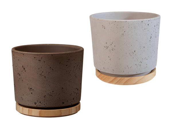 Pot en céramique avec socle en bois