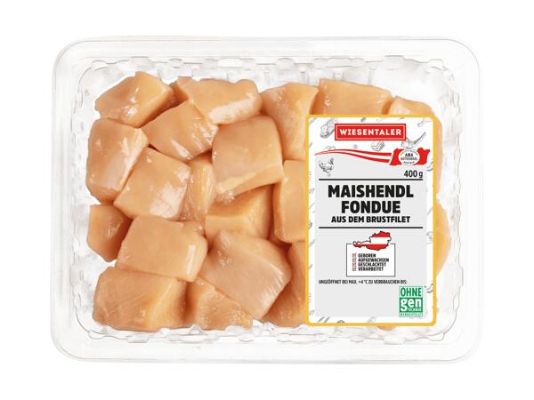 Frisches Maishendl Fondue gewürfelt
