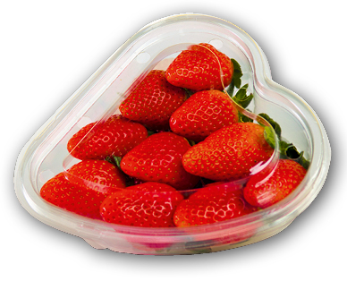 Fraises dans une boîte en forme de cœur