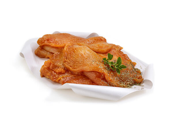 Escalopes de filet de poulet marinées