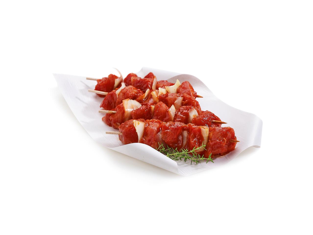 Brochettes de porc aux oignons