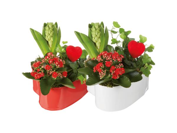 Blomgrupp i zinkhjärta