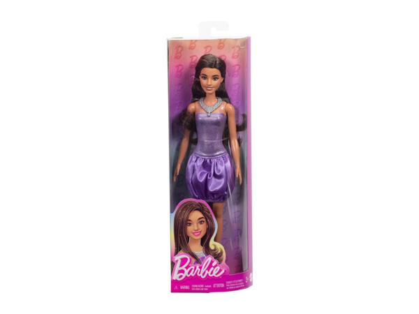 Barbie Doll In A Sparkly Purple Dress