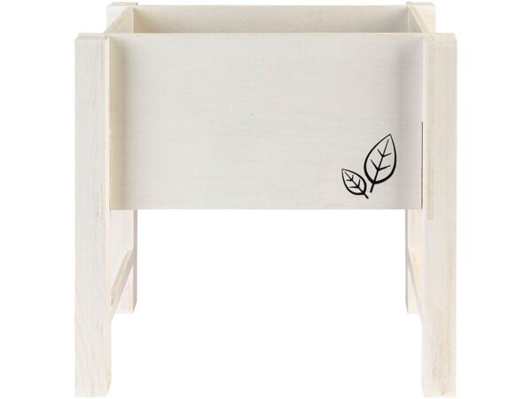 Raised planter box for herbs