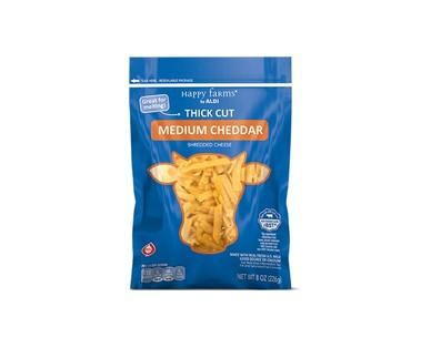 Happy Farms Medium Cheddar or Mild White Cheddar Thick-Cut Shreds