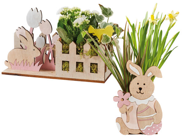 Bepflanzte Osterholzfiguren