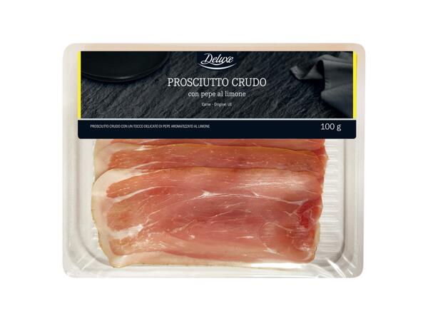 Raw ham with pepper and lemon