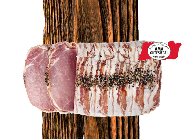 Frische Duroc Karreerose im Speckmantel