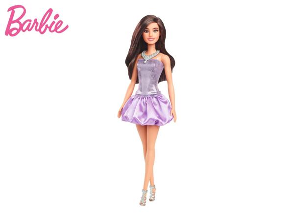 Barbie Doll In A Sparkly Purple Dress
