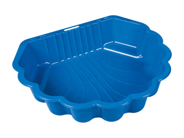 Bac à sable en forme de coquillage