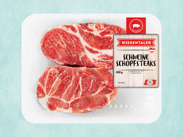 Frische Schweine-Schopfsteaks