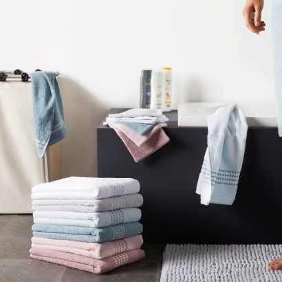 Gants de toilette ou serviettes d'hôtes